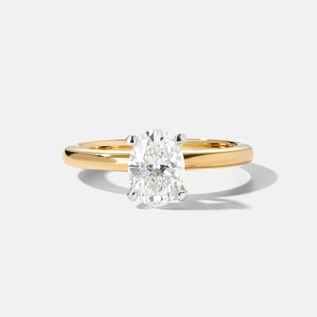 Oval 4 claw Engagement ring 1.5