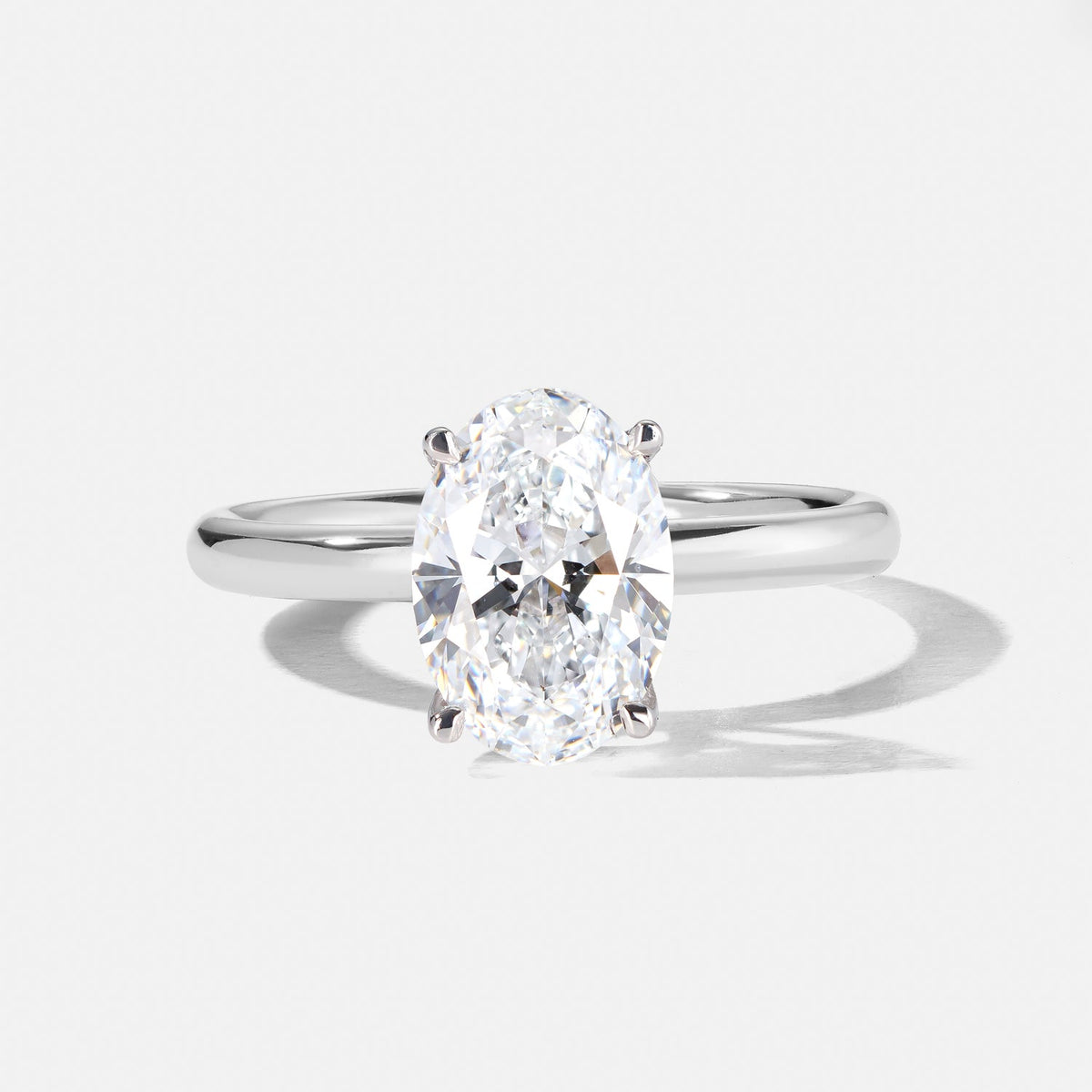 Oval 4 claw  Classic Engagement ring